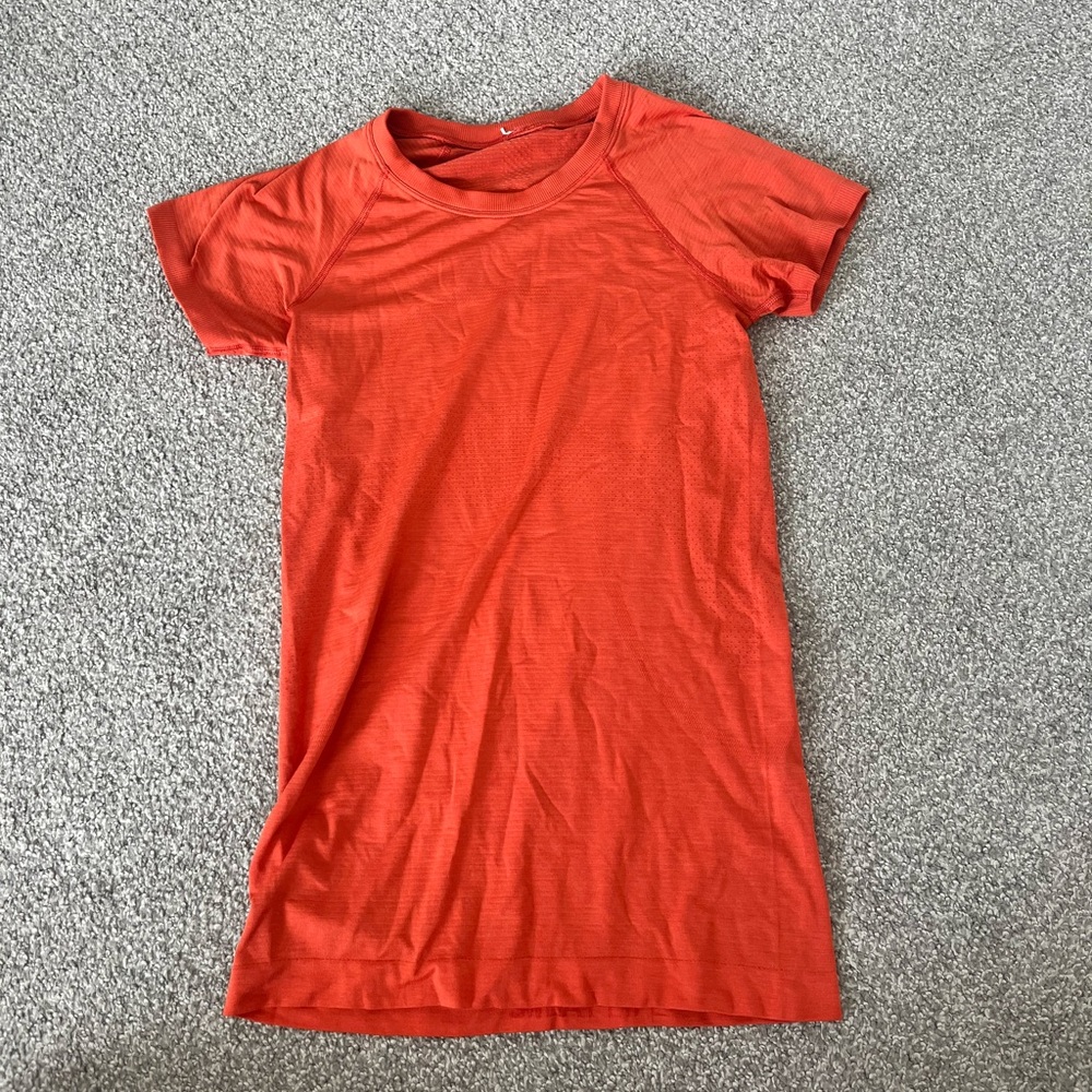 Orange Lululemon shirt